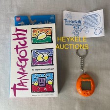 Original Tamagotchi 1996 Tested Working Orange Shell Box Manual Vintage