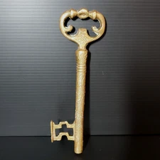vintage-style brass key-shaped bottle opener barware accessories