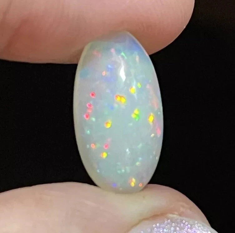 4.7ct 18x9.4x6mm Sparkling Stardust Oval Ethiopian Welo Opal Gemstone Loose Gem - Image 2 of 4