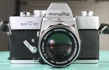 minolta srt 101 35mm slr film camera with 55mm f1.7 lens and leather case