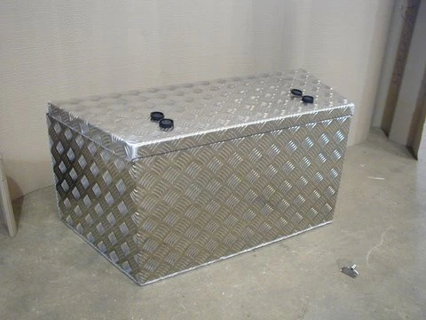 Trailer tongue clearance storage box