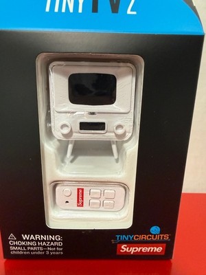 Supreme Tiny TV 2 Mini Television With Remote In Hand Ready To
