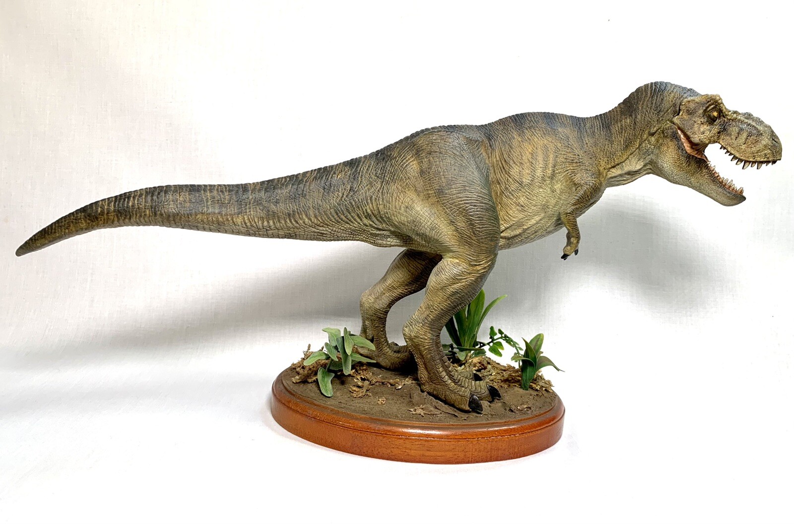 t rex breakout statue