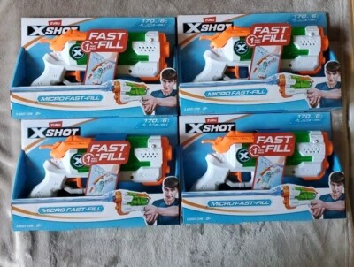 Lot of 4. Zuru X-Shot Micro Fast-Fill Water Gun Blaster Shoots 26 Feet 6Oz. NEW