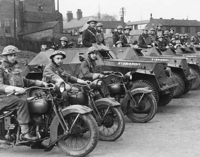 Dutch armoured units being Inspected at a North West town on the o- Old Photo