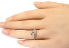 10k white gold .18ct SI2 H round diamond ring 2.5g womens Love knot cluster 6 — photo 7