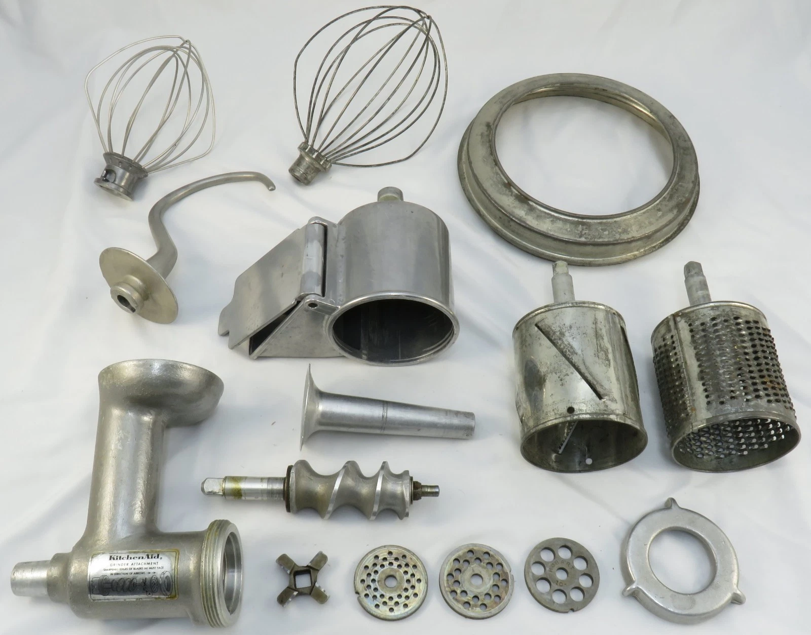 Lot of Vintage KitchenAid Hobart Attachments -grinder, whisk, slicer, hook, ring
Opens in a new wind