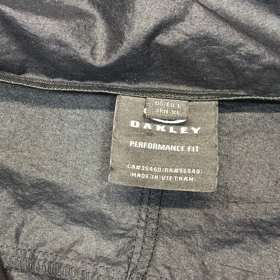 Chaqueta Pullover Oakley Nylon Negra Grande Rendimiento Ajuste Cortavientos Lluvia Con Capucha Foto 3 de 4