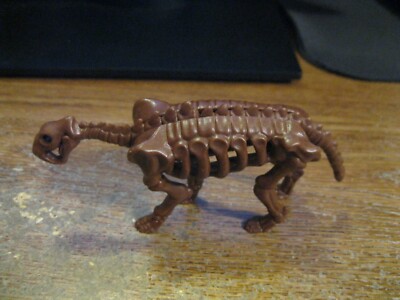 1989 Kenner Burger King Bone Age Saber Tooth Tiger Dynacus Dinosaur