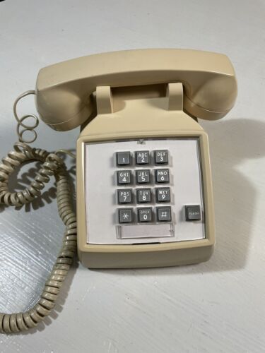 Teléfono de escritorio beige con botón táctil ITT 2500 vintage hecho en EE. UU. tal cual - Imagen 1 de 7