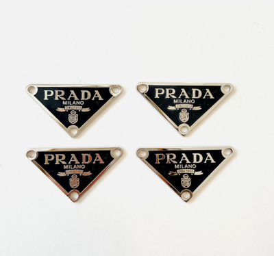 #ad P rada Black Emblem Pendant Bundle set of 4 $49.00