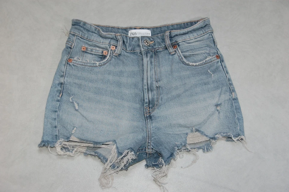 Short jean mode marque Zara taille haute effet used taille 36 - Photo 1/2