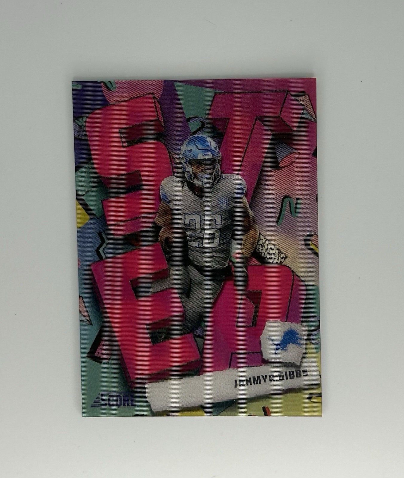 Jahmyr Gibbs #SA-JGS Football Cards 2024 Panini Score Step Ahead trading card — raw and PSA graded price guide