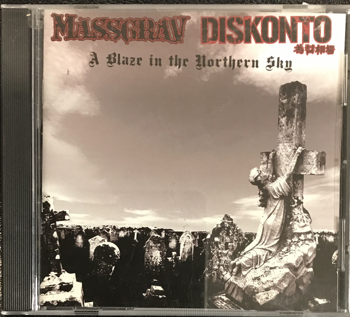 Massgrav / Diskonto ‎– A Blaze In The Northern Sky CD 2006 POLLUTE