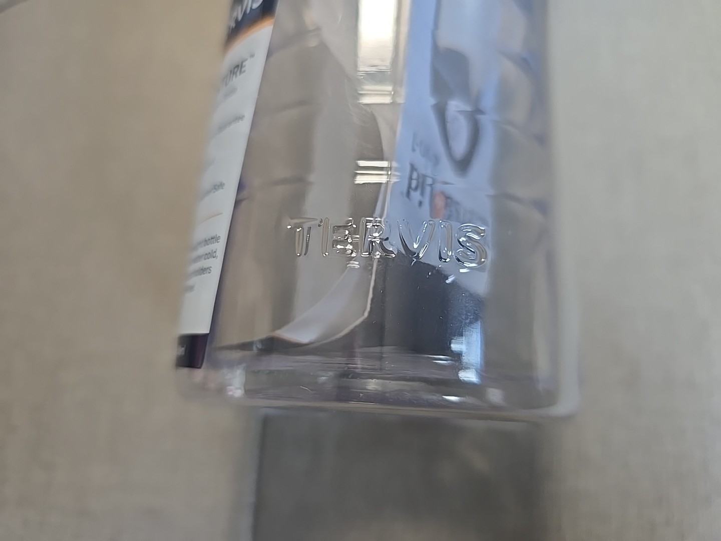 Tervis 24 oz Lite 2-in-1 Water Bottle featuring a "The Meadows CC Sarasota Fl."