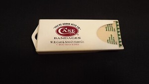 W R CASE XX & Sons Bandages Dispenser with five CASE XX Band-Aids Item 00959