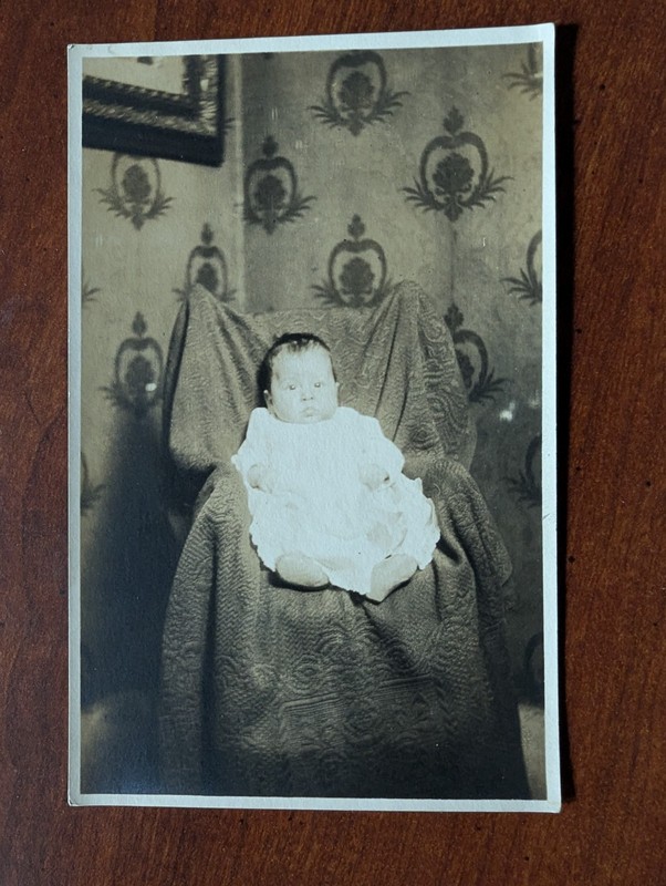 Antique RPPC Infant Baby Child propped up in chair real photo postcard portrait