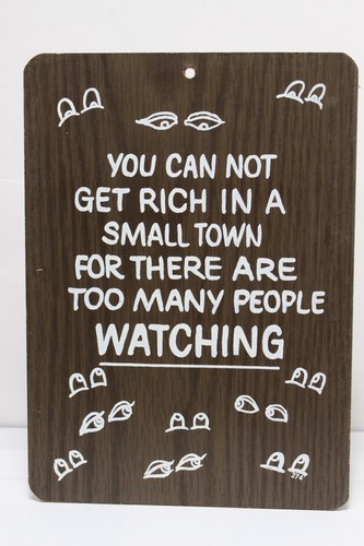 CAN NOT GET RICH IN A SMALL TOWN SIGN WOODEN WALL DECOR FUNNY QUOTE WATCHING EYE