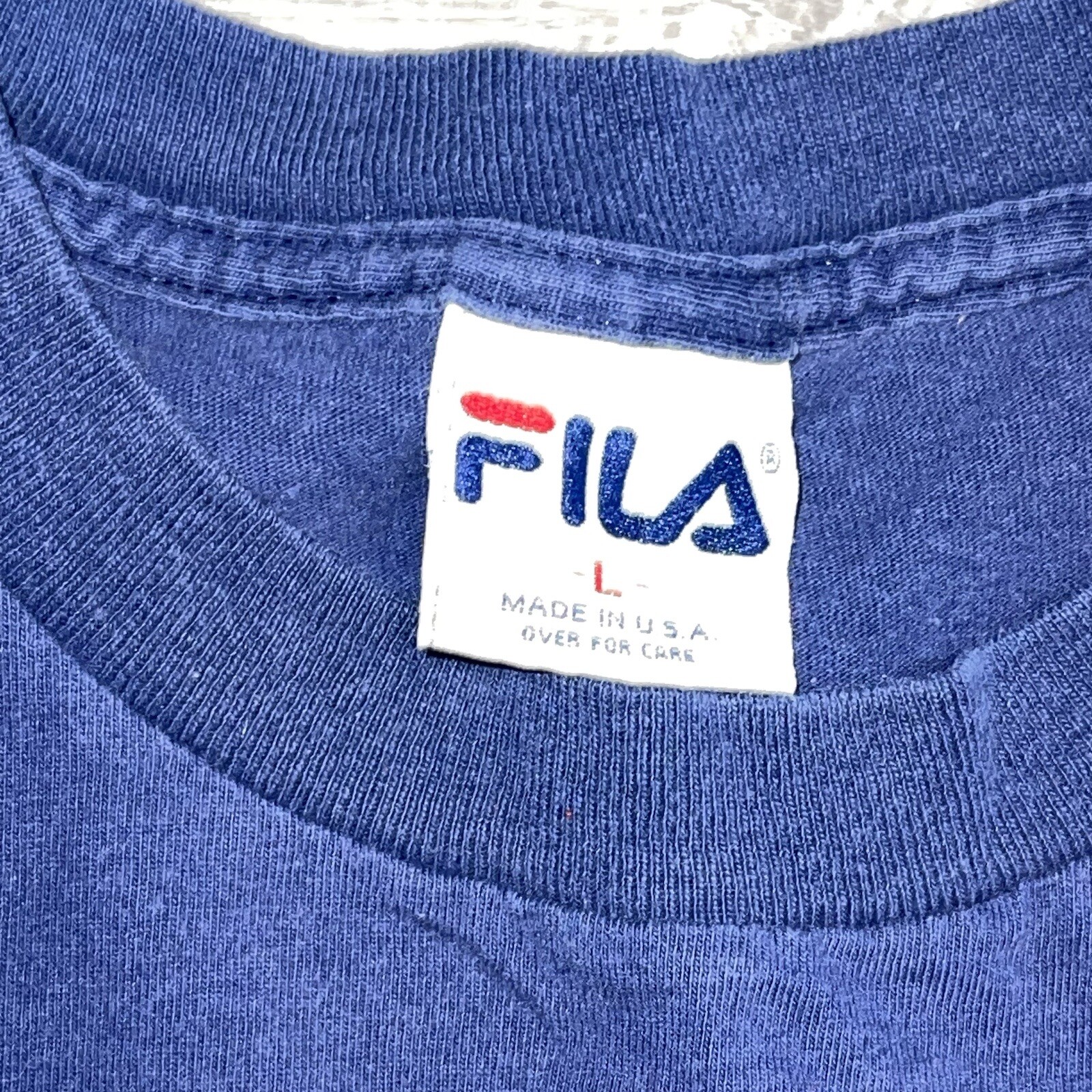 T shirt uomo blu grande vintage anni 90 FILA Spell Out F grafica made in USA