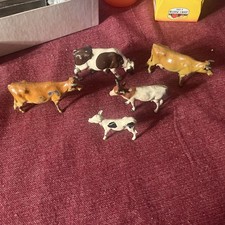 Five Metal Cows