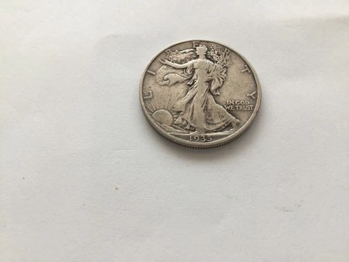 A 1935-D VF Walking Liberty Half.