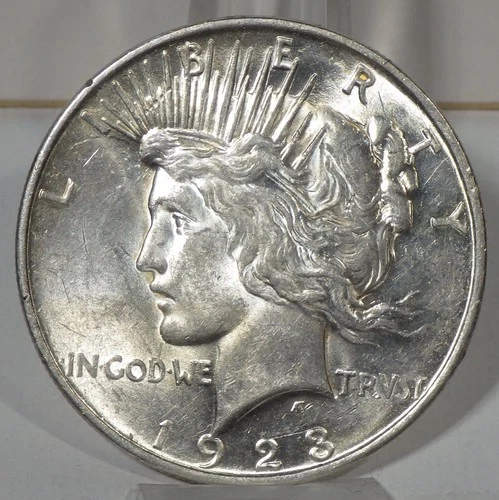 1923-D Peace Silver $1 AU/BU; Jan. 7th Silver Dollar $61.05