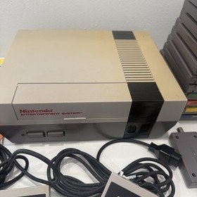 Nintendo NES Console Bundle + 11 Games Mario NFL Controllers Gun Cords Booklets