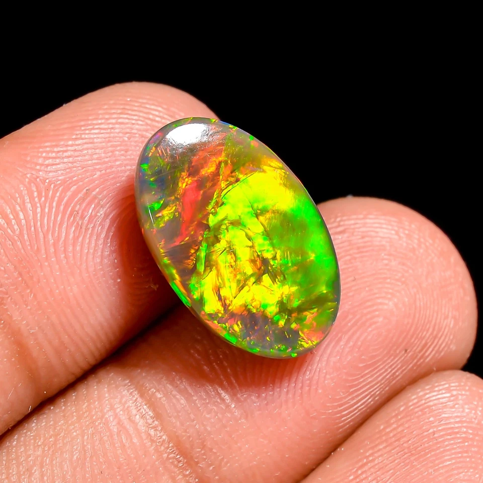 Jeweler's Choice: cabujón de ópalo Welo negro de 4,5 quilates - ovalado de 15x9 mm - impresionante fuego Foto 3 de 3