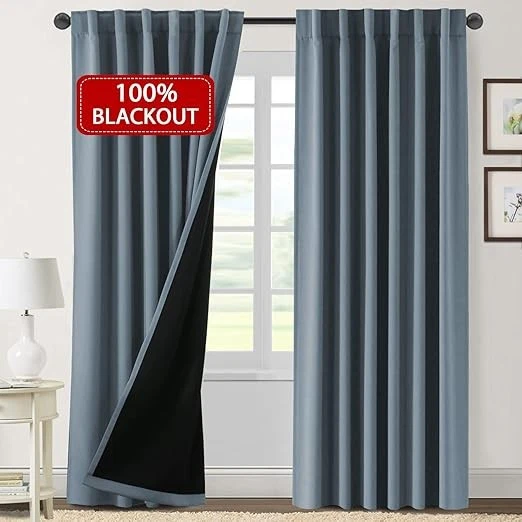 set of two blue-gray 84-inch blackout curtain panels