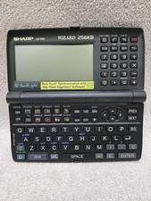 Sharp OZ-630 Wizard 256KB Calculator Organizer Part Or Repair NO power Cord