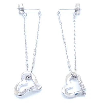 Boucles d'oreilles STAR JEWELRY coeur or blanc 18 carats diamant 0,007 ct x 2... - Photo 1/4