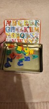 Vintage 1980's Plastic Alphabet Partial Set Magnets in Matching Tin Storage Box
