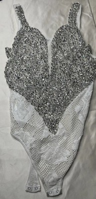 Eye Candy brand Bodysuit features dense, heavy rhinestone embellishments,2X/3X