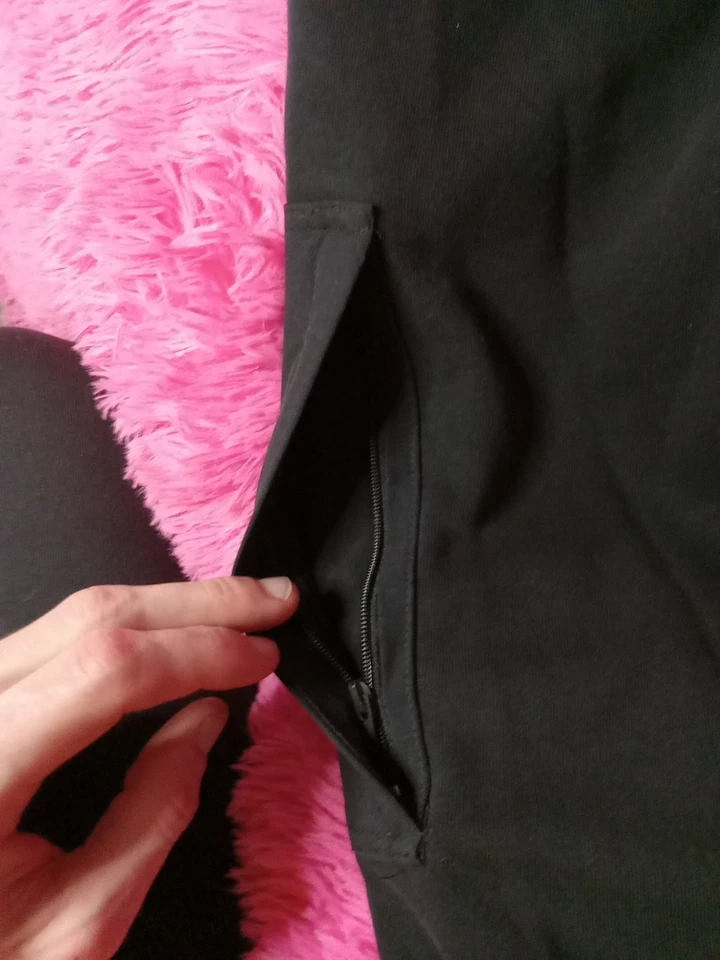 Pantalones de vellón Adidas Essentials BrandLove para hombre talla pequeña negros y naranjas Foto 4 de 4