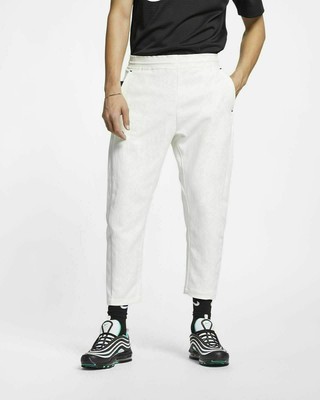 nike tech woven cropped pant