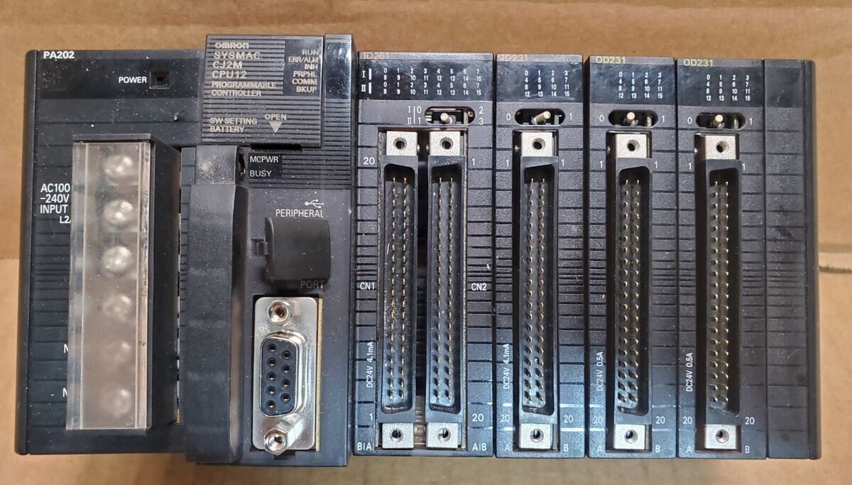 Omron PLC CJ2M-CPU12 Pwr Supply CJ1W-PA202 ID261 ID231 OD231 Modules Omron PLC CJ2M-CPU12 Pwr Supply CJ1W-PA202 ID261 ID231 OD231 Modules