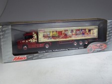 (YG-45, KD) Schuco 23903 Scania T124L Christmas 2002 in 1:87 in OVP