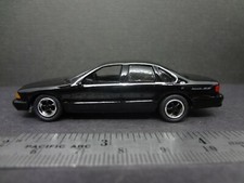 Johnny Lightning 1996 Chevrolet Impala SS black - Loose 1:64