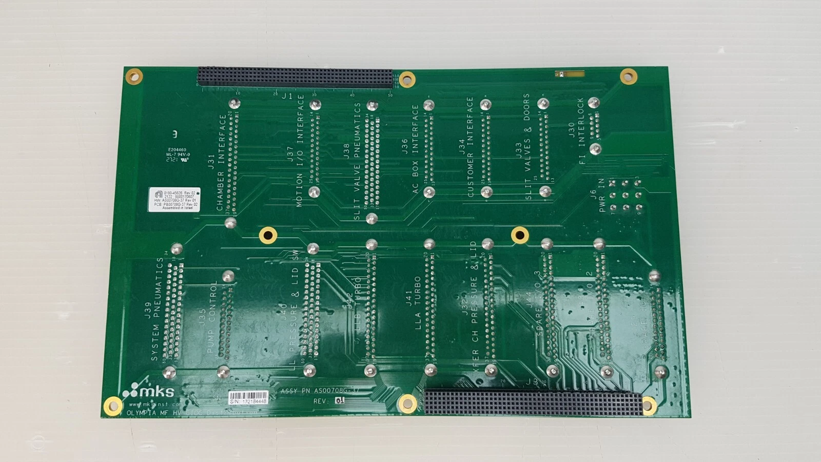 Back of the MKS AS00708G-37 board with connector solder rows and AMAT label
