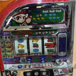 Collectible Mechanical Slot Machine with Anime Graphics and Animated Reels