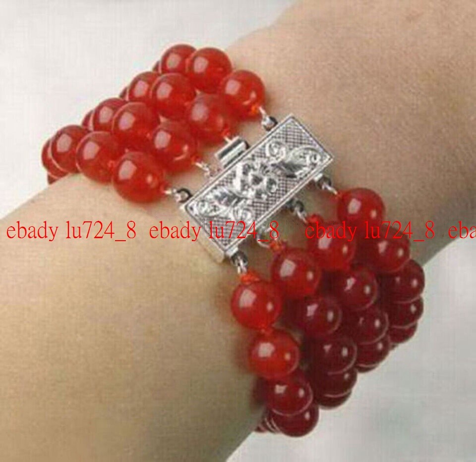 Stretch 7.5" Bracelet With 10mm Natural Red Jade Round Beads - AAA Quality Gemstone