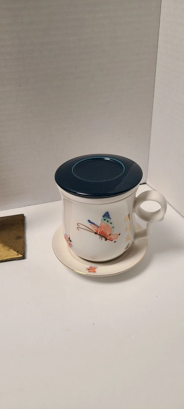 Lovely 4 Piece Teavana Tea Cup. Includes saucer, Infuser & Lid Butterfly Design