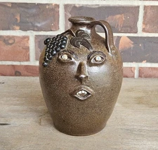 Superb Jack T Maness Face Jug With Grapes