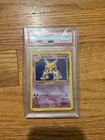Wizards of the Coast 1999 Pokemon Base Set 2 Alakazam Holo #1 PSA 8