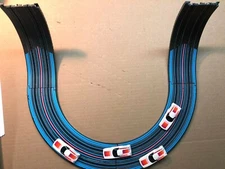 Aurora AFX Lazer 4pc Track set, 2pc straight + 2pc curve + 4 slot car bodies 