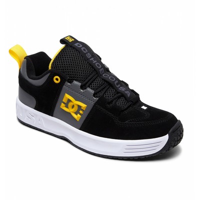 black and yellow dc shoes