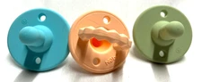 Three NUBY Silicone Pacifiers