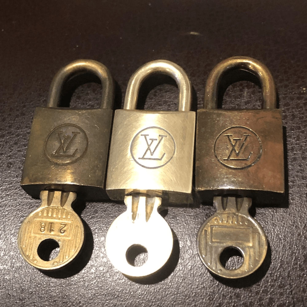 Louis Vuitton, Bags, Lv Gold Lock Key 338