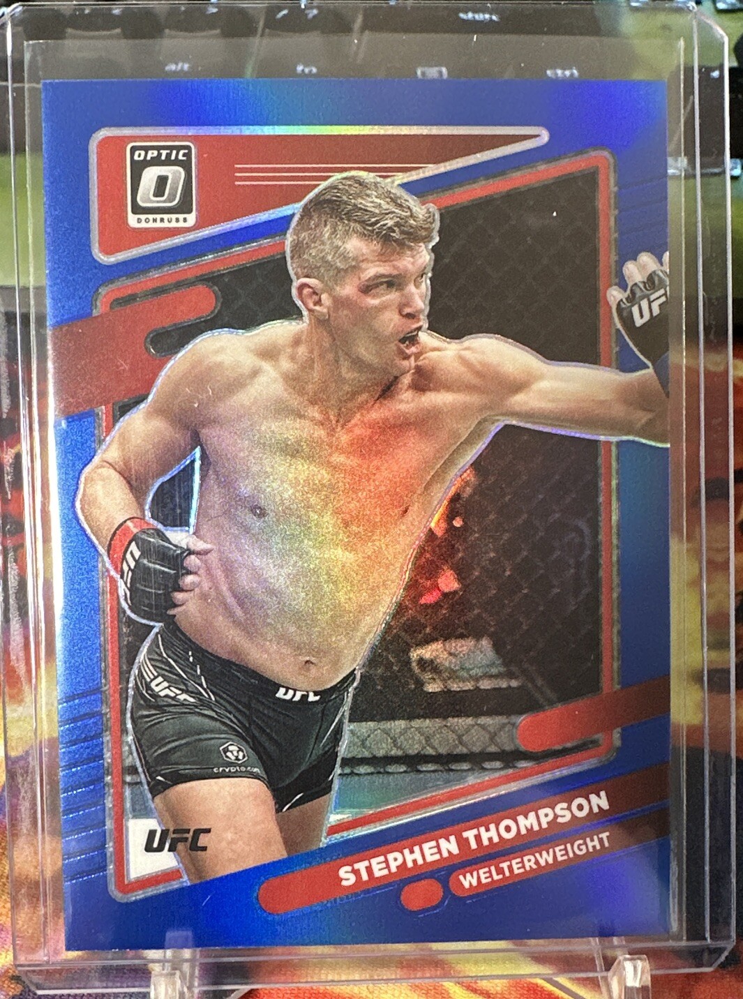 Stephen Thompson 2022 Panini Optic UFC blue /99
