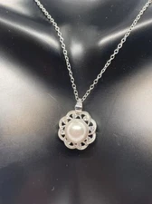 Flower shape white pearl center pendant necklace with lab created diamonds